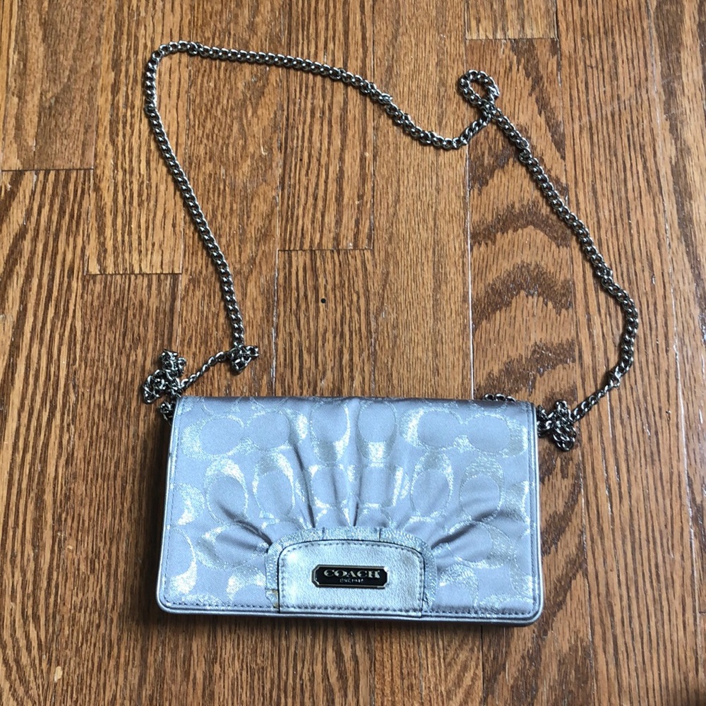 Coach clutch with removable strap